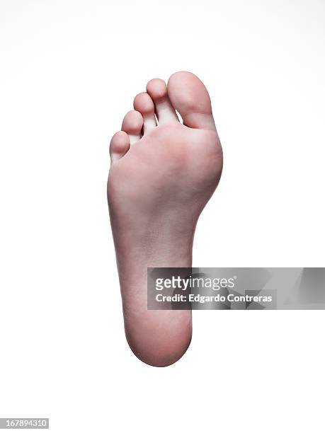 bare foot on white background - sole of foot stock pictures, royalty-free photos & images