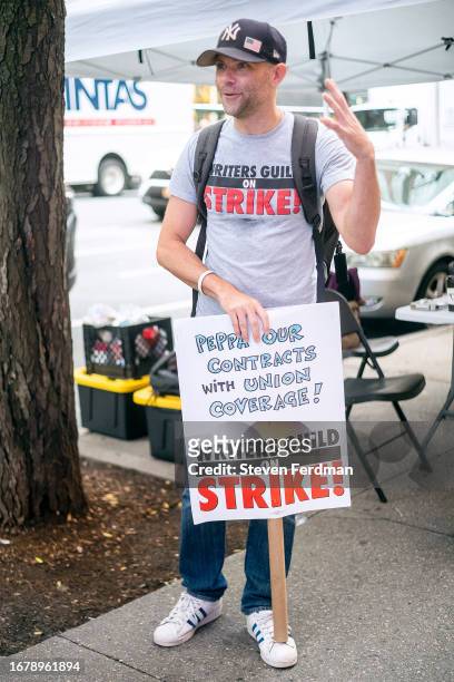 Actor Mikey Day joins members of the Writers Guild of America walking a picket line outside of "The View" at ABC Studio headquarters on September 13,...