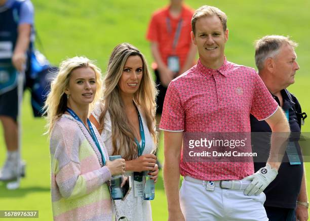 Dan Walker of England talks with Nadiya Bychkova of Ukraine the champion ballroom dancer and her friend Suzie Barker during the pro-am prior to the...