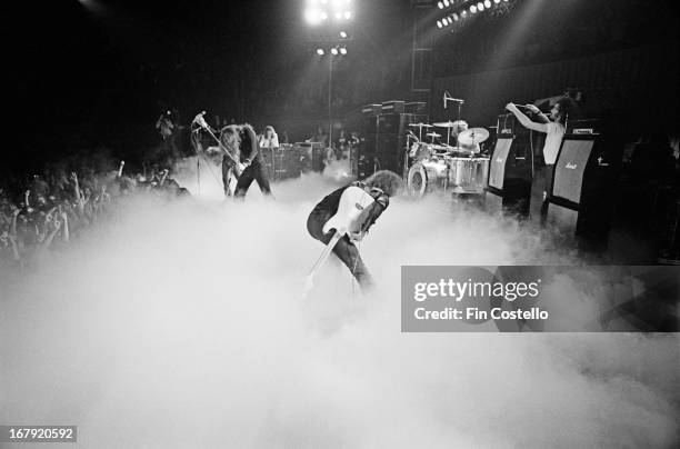 1st NOVEMBER: Rock group Deep Purple perform live on stage during the band's American tour in November 1974. Left to right: Glenn Hughes , David...