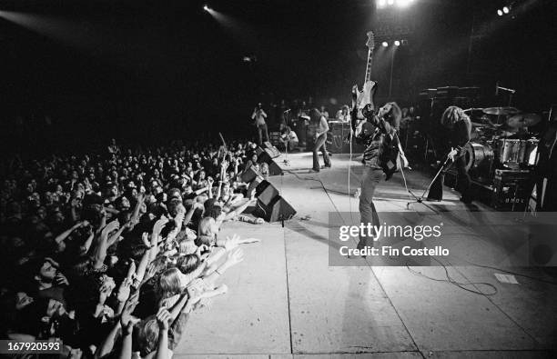 1st NOVEMBER: Rock group Deep Purple perform live on stage during the band's American tour in November 1974. Left to right: Glenn Hughes, Jon Lord ,...