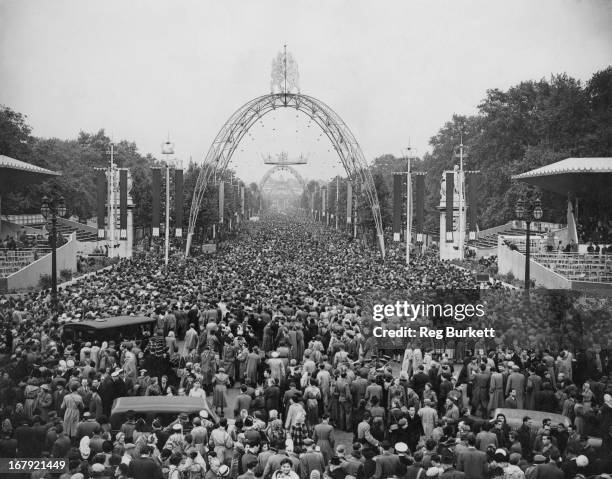 Vast crowd has gathered to watch the return of Queen Elizabeth II to the Palace after the Coronation State Drive through London, 2nd June 1953.