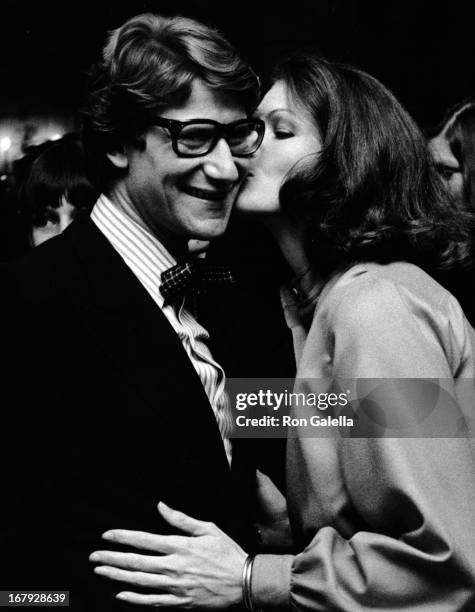 Yves Saint Laurent and Lois Chiles attend Yves Saint Laurent Haute Couture Collection Fashion Show on November 5, 1974 at the Pierre Hotel in New...