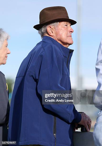 Cot Campbell the owner of Palace malice watches his horse run on the track during the morning training for the 2013 Kentucky Derby at Churchill Downs...