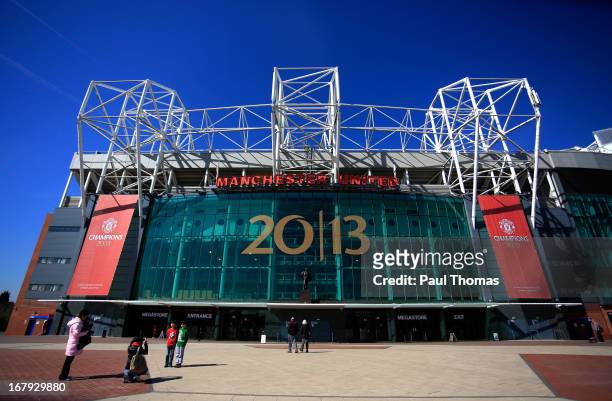 Banner is displayed outside the home Manchester United FC at Old Trafford on May 2, 2013 in Manchester, England. Manchester United are celebrating...