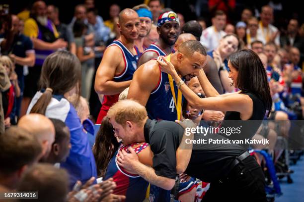 Prince Harry, Duke of Sussex and Meghan, Duchess of Sussex are seen at the wheelchair basketball final between the United States and France during...