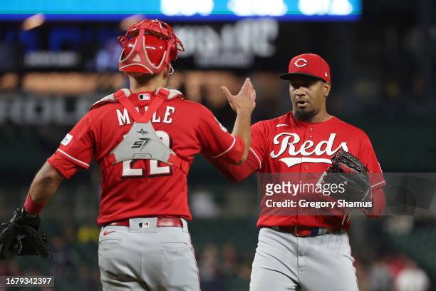 Alexis Diaz of the Cincinnati Reds celebrates a 4-3 win over the Detroit Tigers with Luke Maile oat Comerica Park on September 13, 2023 in Detroit,...