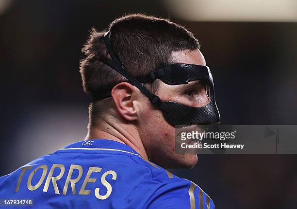 Masked Fernando Torres of Chelsea looks on during the UEFA Europa League semi-final second leg match between Chelsea and FC Basel 1893 at Stamford...