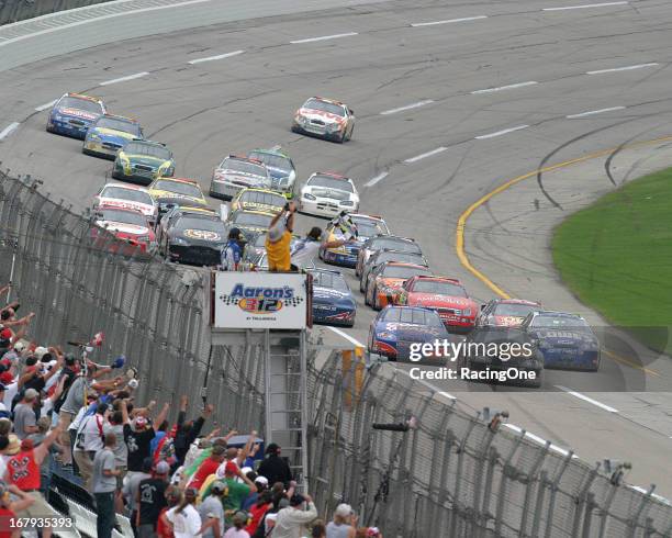 April 29, 2006: Martin Truex, Jr. In the Bass Pro Shops Chevrolet leads the Coast Guard Chevrolet of Kevin Harvick and the Lowe's Chevrolet of Kyle...