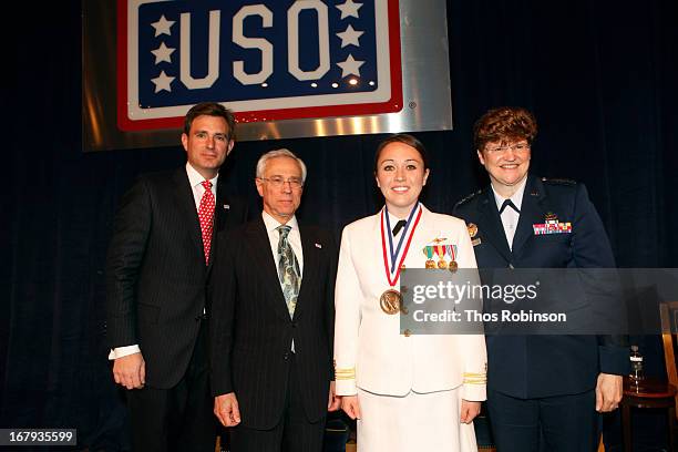 Brian C. Whiting, president and CEO of USO of Metropolitan New York, colonel Jack H. Jacobs, United States Army and medal of honor recipient,...