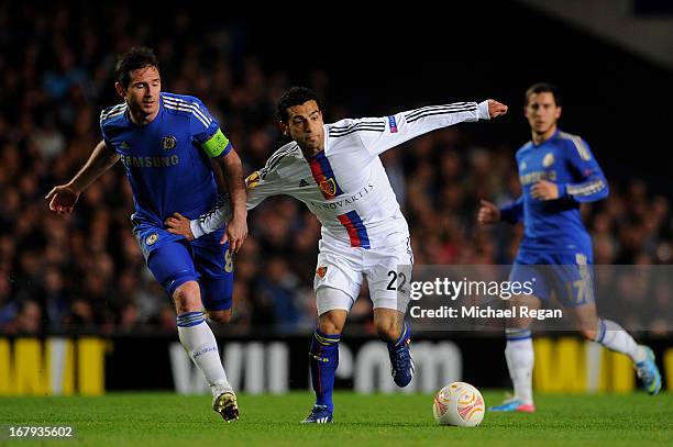 Mohamed Salah of Basel holds off Frank Lampard of Chelsea during UEFA Europa League semi final second leg match between Chelsea and FC Basel 1893 at...