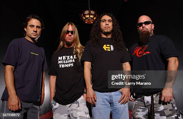 Dave Lombardo, Jeff Hanneman, Tom Araya and Kerry King of Slayer pose for a portrait at Revolution on May 11, 2002 in Fort Lauderdale, Florida. :