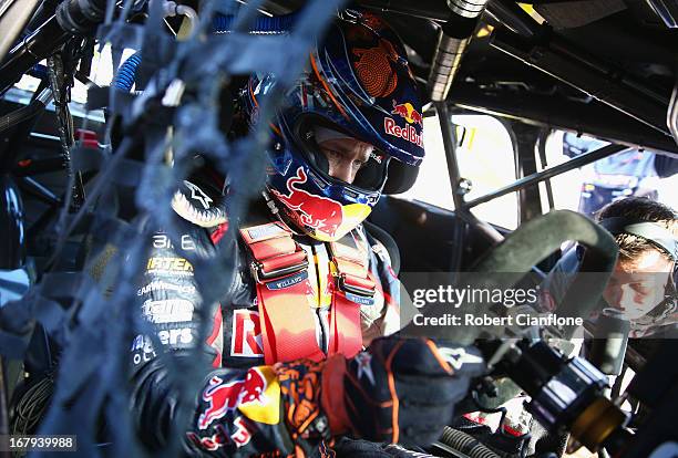 Casey Stoner driver of the Red Bull Pirtek Holden sits in his car prior to practice for round two of the V8 Supercars Dunlop Development Series at...