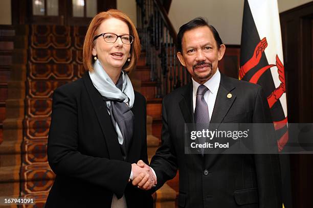 The Sultan of Brunei, Hassanal Bolkiah and the Prime Minister of Australia Julia Gillard talk at the Lodge on May 3, 2013 in Canberra, Australia. The...