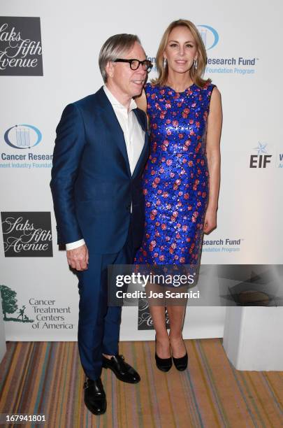 Designer Tommy Hilfiger and Dee Hilfiger attend EIF Womens Cancer Research Funds 16th Annual An Unforgettable Evening presented by Saks Fifth...