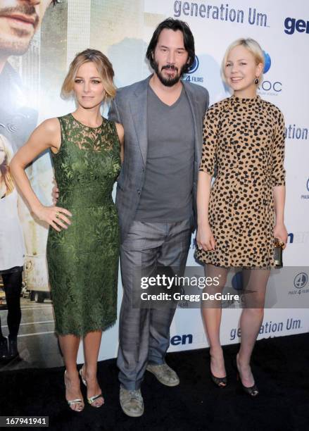 Actors Bojana Novakovic, Keanu Reeves and Adelaide Clemens arrive at the Los Angeles premiere of "Generation UM" at ArcLight Hollywood on May 2, 2013...