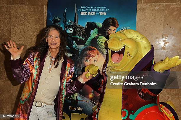 Aerosmith singer Steven Tyler poses with character Nim Galuu during a photo call at Crown Towers on May 3, 2013 in Melbourne, Australia.