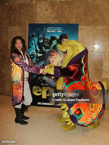 Aerosmith singer Steven Tyler poses with character Nim Galuu during a photo call at Crown Towers on May 3, 2013 in Melbourne, Australia.