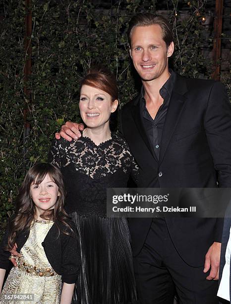 Onata Aprile, Julianne Moore and Alexander Skarsgard attend The Cinema Society With Tod's & GQ screening of Millennium Entertainment's "What Maisie...