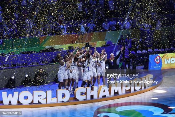 Team Germany celebrate during the awarding ceremony after the final between Germany and Serbia at the 2023 FIBA World Cup in Manila, the Philippines,...