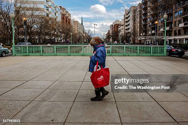 Connie Picciotto, who has maintained a protest vigil in front of the White House since the early 1980's, walks home to Peace House after her daily...