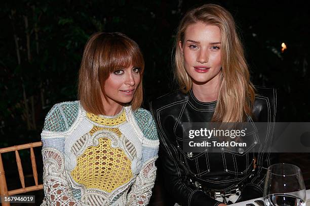 Nicole Richie and Rosie Huntington-Whiteley attend the Balmain LA Dinner at Chateau Marmont on May 2, 2013 in Los Angeles, California.