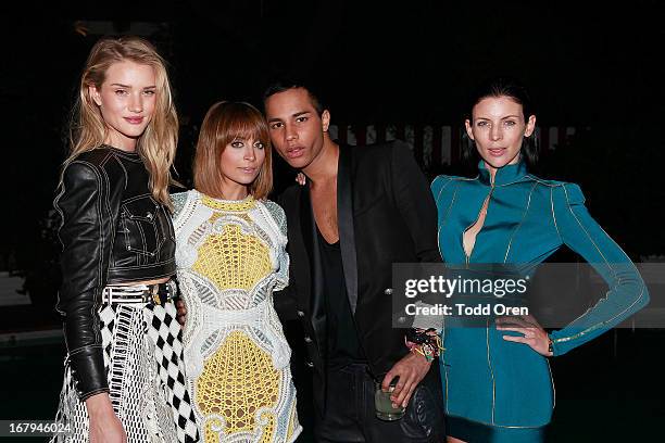 Actress Rosie Huntington-Whiteley, Nicole Richie, Designer Olivier Rousteing, Actress Liberty Ross attend the Balmain LA Dinner at Chateau Marmont on...
