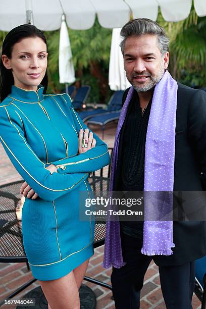 Actress Liberty Ross and Carlos Mota attends the Balmain LA Dinner at Chateau Marmont on May 2, 2013 in Los Angeles, California.