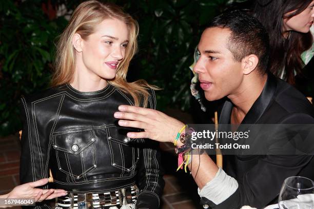 Rosie Huntington-Whiteley and Designer Olivier Rousteing attend the Balmain LA Dinner at Chateau Marmont on May 2, 2013 in Los Angeles, California.
