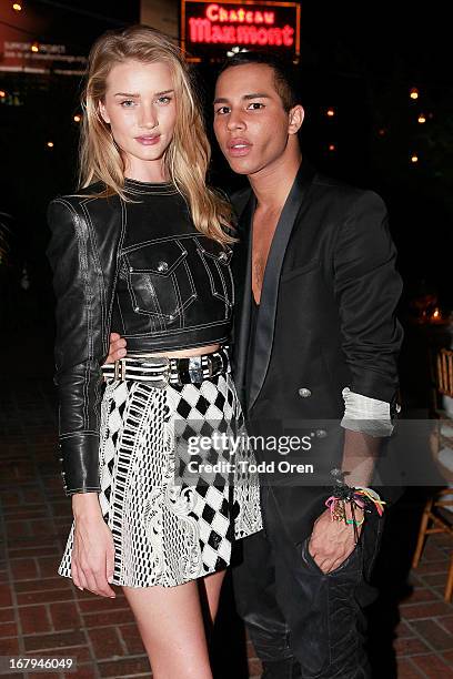 Actress/model Rosie Huntington Whiteley and Designer Olivier Rousteing attends the Balmain LA Dinner at Chateau Marmont on May 2, 2013 in Los...