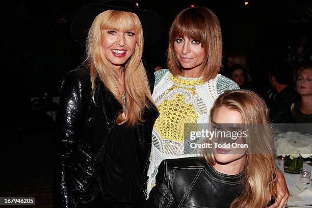 Designer Rachel Zoe, Nicole Richie and Rosie Huntington-Whiteley poses at the Balmain LA Dinner at Chateau Marmont on May 2, 2013 in Los Angeles,...