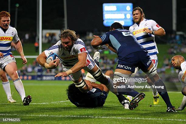 Andries Bekker of the Stormers dives for the try in the first half during the round 12 Super Rugby match between the Blues and the Stormers at North...