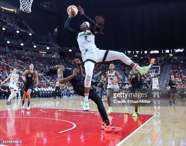 Kahleah Copper of the Chicago Sky drives into Chelsea Gray of the Las Vegas Aces in the first quarter of Game One of the 2023 WNBA Playoffs first...
