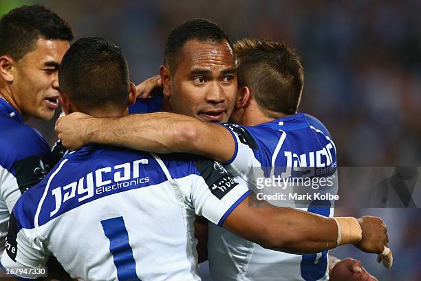 Tony Williams of the Bulldogs celebrates with his team mates after scoring a try the round eight NRL match between the Bulldogs and the Wests Tigers...