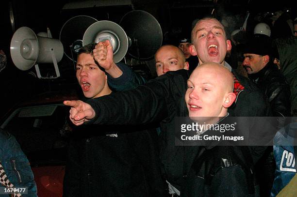 German neo-Nazis march in protest of the visit of Israel's president December 9, 2002 in Berlin, Germany. Despite freezing temperatures, about 100...