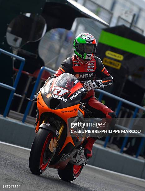 Repsol Honda Team motoGP's Italian rider Claudio Corti prepares to take part in the first MotoGP free practice of the Spanish Grand Prix at the Jerez...