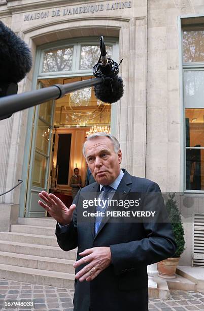 French Prime minister Jean-Marc Ayrault speaks in front of the Maison de l’Amérique Latine on May 3, 2013 in Paris after a work seminar with...