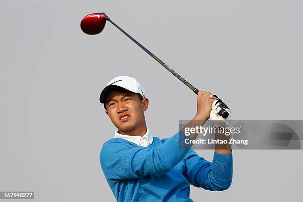 Year-old Ye Wo-cheng of China plays a shot during the second day of the Volvo China Open at Binhai Lake Golf Course on May 3, 2013 in Tianjin, China.