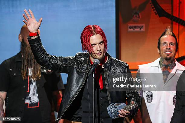 Drummer Arejay Hale of Halestorm receives the "Best Drummer" award at the 5th annual Revolver Golden Gods award show at Club Nokia on May 2, 2013 in...