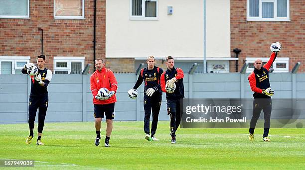 Brad Jones, goalkeeping coach John Achterberg, Peter Gulacsi, Jamie Stephens and Pepe Reina of Liverpool FC take part in a training session at...