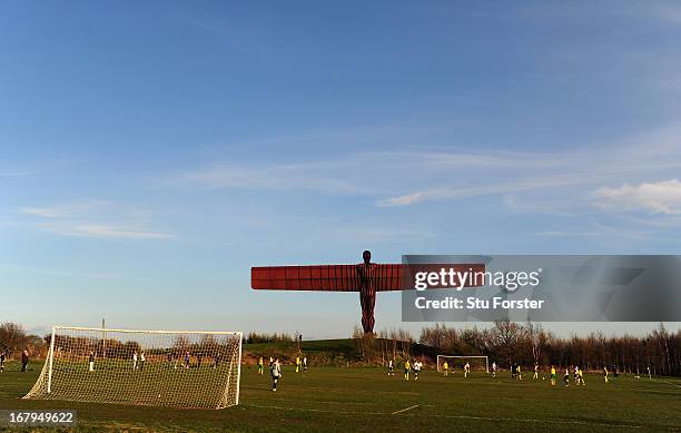 The Anthony Gormley "Angel of the North" sculpture overlooks the match between Gateshead and Esh Winning on May 2, 2013 in Gateshead, England.