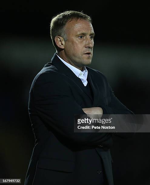 Cheltenham Town manager Mark Yates looks on during the npower League Two Play Off Semi Final 1st leg match between Northampton Town and Cheltenham...