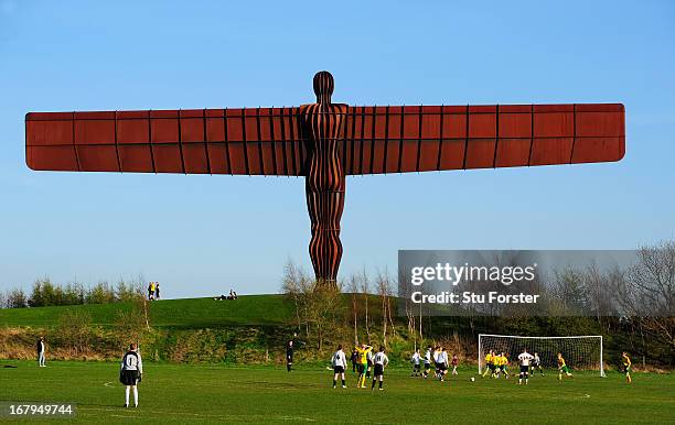 The Anthony Gormley "Angel of the North" sculpture overlooks the match between Gateshead and Esh Winning on May 2, 2013 in Gateshead, England.