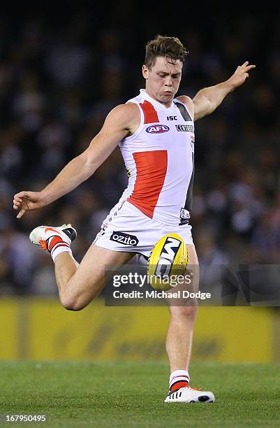 Jack Steven of the Saints kicks the ball during the round six AFL match between the Collingwood Magpies and the St Kilda Saints at Etihad Stadium on...