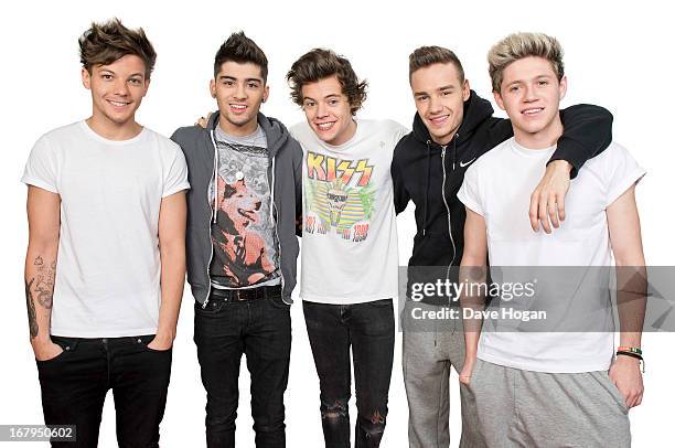 Pop band One Direction are photographed on April 20, 2013 in London, England.