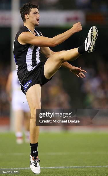 Scott Pendlebury of the Magpies kicks the ball during the round six AFL match between the Collingwood Magpies and the St Kilda Saints at Etihad...