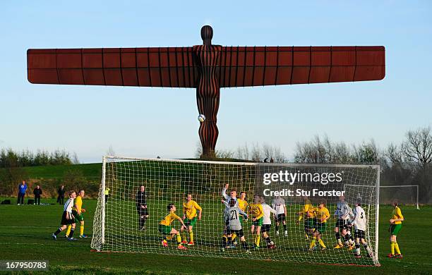 The Anthony Gormley "Angel of the North" sculpture overlooks the match between Gateshead and Esh Winning on May 2, 2013 in Gateshead, England.