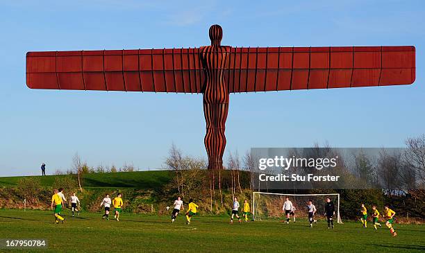 The Anthony Gormley "Angel of the North" sculpture overlooks the match between Gateshead and Esh Winning on May 2, 2013 in Gateshead, England.