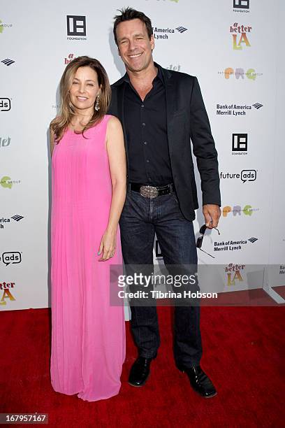 Nanci Chambers and David James Elliott attends a better LA 'An Evening With A View' annual gala at AT&T Center on May 2, 2013 in Los Angeles,...
