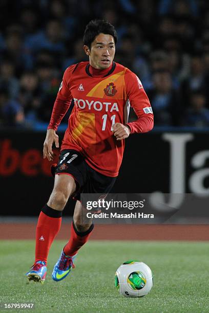 Keiji Tamada of Nagoya Grampus in action during the J.League match between Kawasaki Frontale and Nagoya Grampus at Todoroki Stadium on May 3, 2013 in...